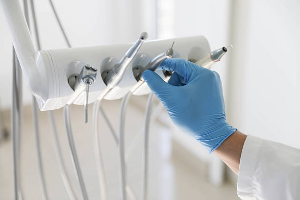 Professional Emergency Dentist technician working in Fayetteville, AL